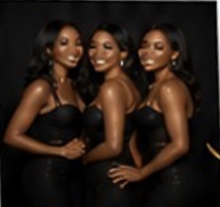 Original photo booth capture of three guests in black dresses